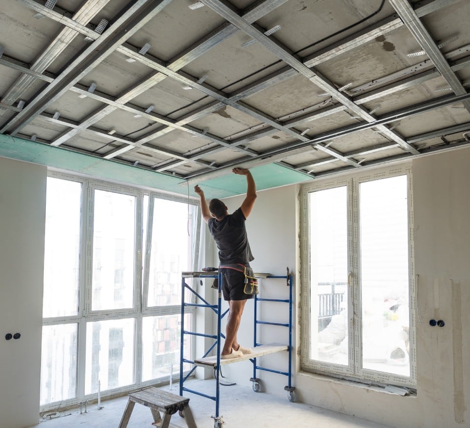 drywall installers men holding gypsum board figured cut high quality